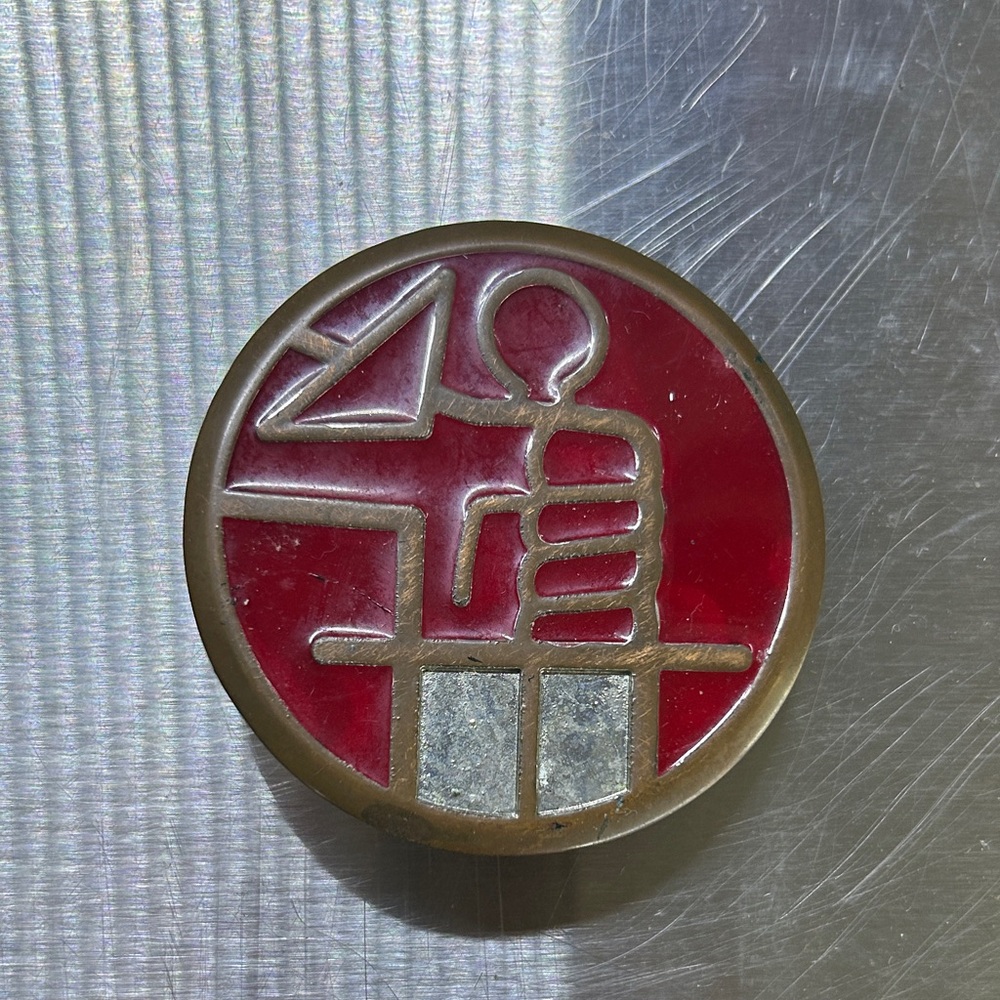 Vintage HellBoy Red and Gold Round belt buckle.